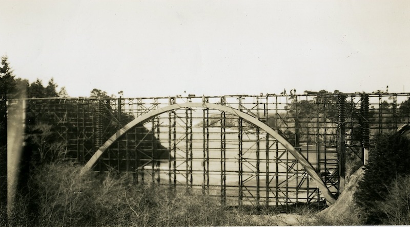Arched bridge with scaffolding
