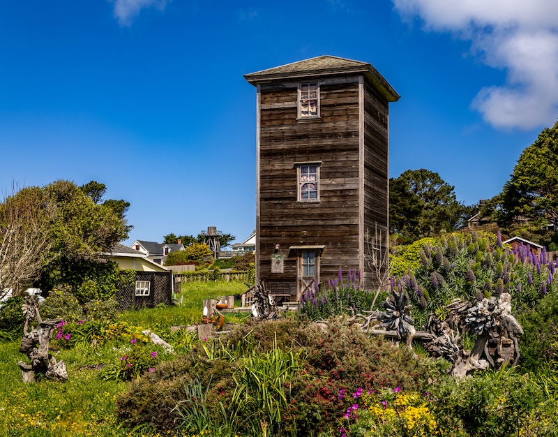 Enclosed Water Tower in a flowering garden