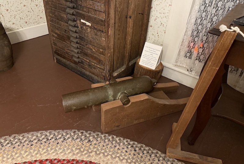 Small brass cannon in carriage