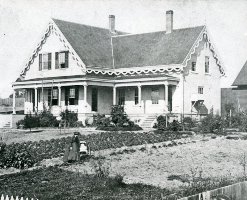 Victorian House with scrollwork and two chimneys